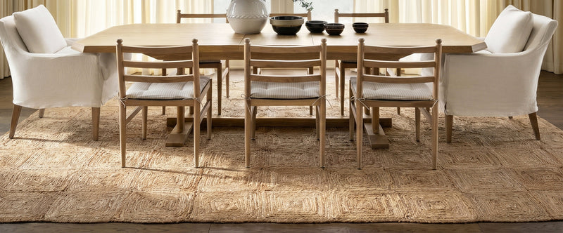 LOOMY Boxed In Natural jute rug in a neutral dining room