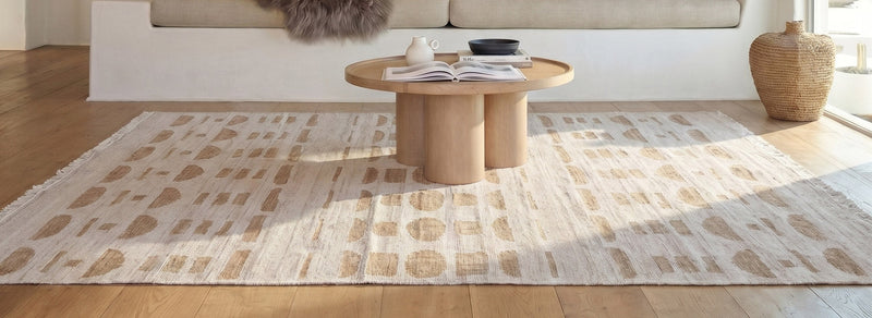 Delve performance rug by LOOMY, a pet-friendly low-pile weave in a bright living room