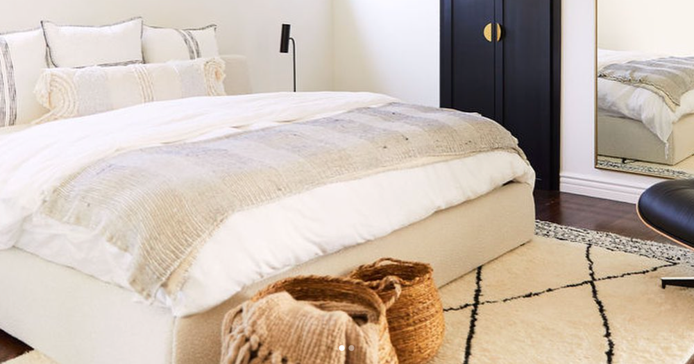 Should you put a rug under your bed?