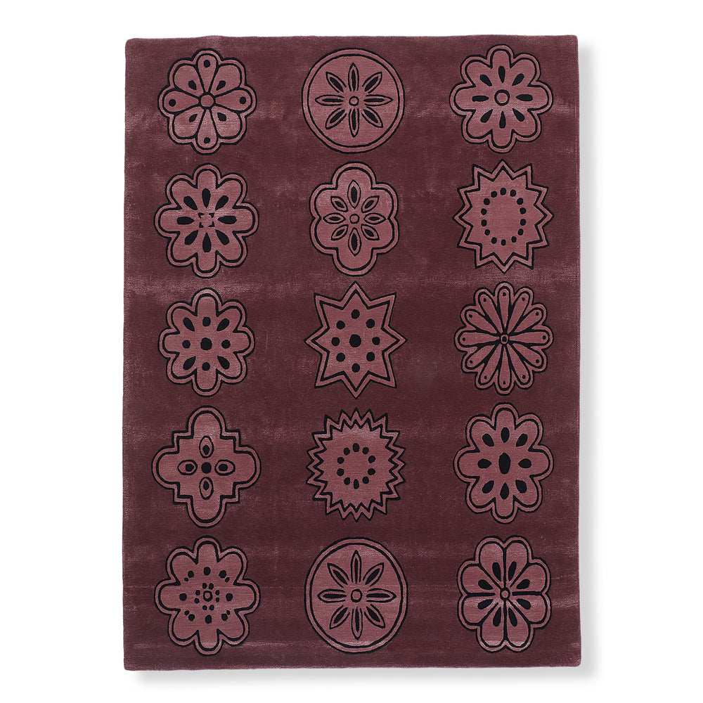 Dotta hand-tufted viscose and wool rug in deep plum with a grid of tonal floral medallions
